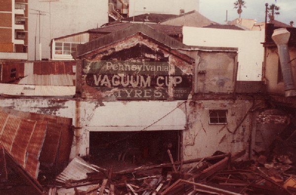 Interior of McLeods Garage partially collapsed after storm, early 1980s